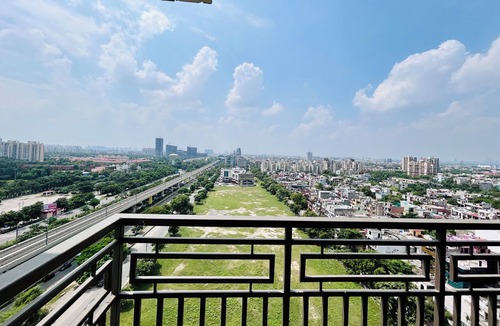 Jaypee Greens Apartment | PrimeStays Studio | Couples, Work & Travel Ready near expo mart greater noida
