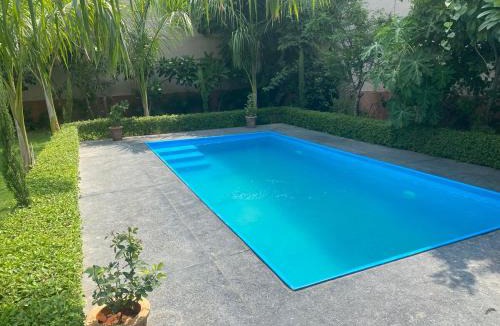 Khattalwada Villa | private pool Glasshouse11 Villa Akira Homes