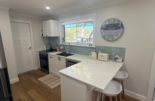Corlette House | Pupper's Paradise | Coastal Comfort in Corlette Family & Pet friendly Retreat
