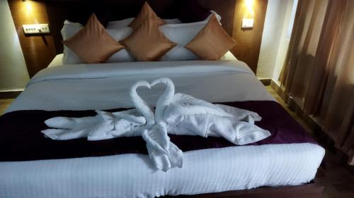Vadakara Hotel | Queens Tourist Home