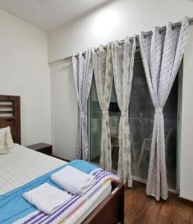 Kadadhe Apartment | Riverside 1BHK Apartment at Lodha Belmondo Golf Resort, Pune