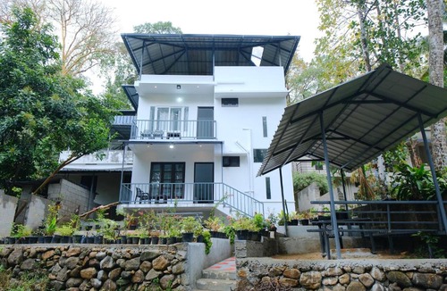 Ponmundi House | Riverside Bliss Villa