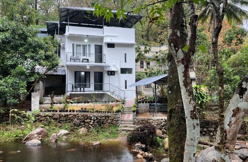 Ponmundi House | Riverside Bliss Villa