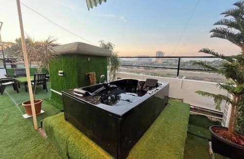 Meera Nagar Apartment | Riverside Jacuzzi Terrace patio with safety