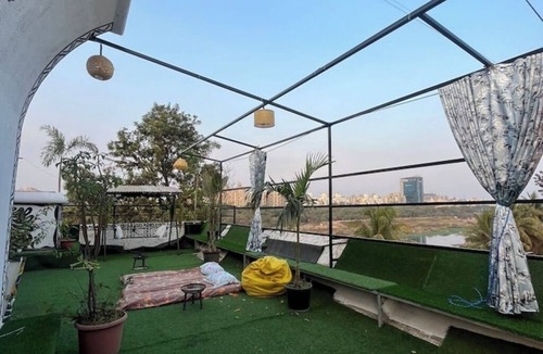 Meera Nagar Apartment | Riverside Jacuzzi Terrace patio with safety