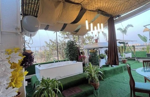 Meera Nagar Apartment | Riverside Jacuzzi Terrace patio with safety