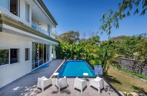 Alibaug Villa | SaffronStays 7 Seas - 7BR pool villa with gazebo, bar & lawn, perfect for celebrations near Mandwa Jetty
