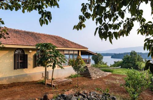 Wadgaon Villa | SaffronStays Anantham - 3BR Pet-Friendly Kerala-Style Lakefront Villa with Verandah & Views