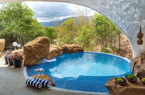 Murbad Villa | SaffronStays AsanjA Titaly - 2BR earth-sheltered pool villa with rooftop garden, Sahyadri hill views near Mumbai