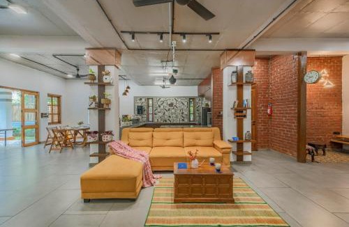 Nagaon Villa | SaffronStays Atmos - 3BR rustic pool villa with projector screen, table tennis, carrom & cozy family spaces in Nagaon