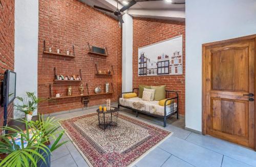 Nagaon Villa | SaffronStays Atmos - 3BR rustic pool villa with projector screen, table tennis, carrom & cozy family spaces in Nagaon