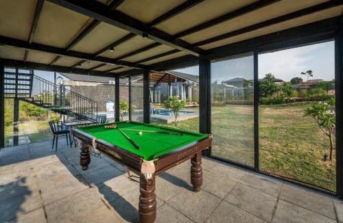 Nashik Villa | SaffronStays Black Rock - 3BR pet-friendly eco-luxe villa with pool, game room & sunrise deck in Nashik