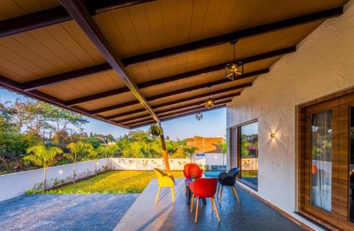 Anjaneri Villa | SaffronStays Blue Jasmine - twin 2BR pet-friendly villas with plunge pool, gardens & birdwatching near Sula Vineyard