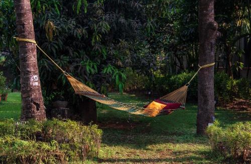Alibaug Villa | SaffronStays Casa Del Palms - 8BR luxury pool villa with gazebo, pickleball, bar & lawns near Nagaon Beach