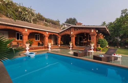 Kune Village Villa | SaffronStays Chira-5BR heritage villa with laterite stone walls, verandah sit-outs & private pool