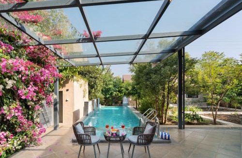Nashik Villa | SaffronStays Eden - 3BR vineyard-side pool villa with jacuzzi, farm dining, stargazing deck & lawns for celebrations