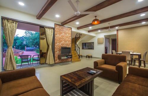 Suryamal Villa | SaffronStays Ekaant- 3BR pet-friendly pool villa with lawn, games & river walk in gated community near Mumbai