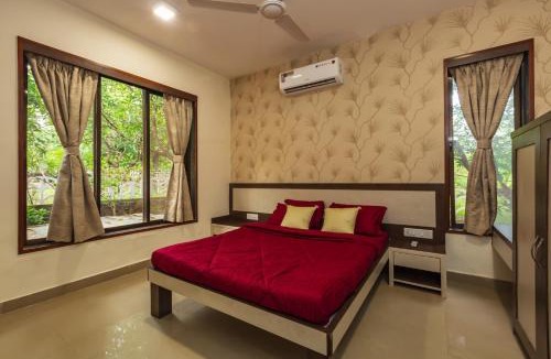 Suryamal Villa | SaffronStays Ekaant- 3BR pet-friendly pool villa with lawn, games & river walk in gated community near Mumbai