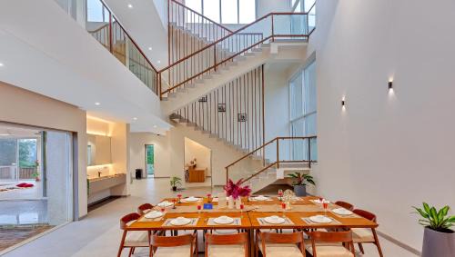 Karjat Villa | SaffronStays Grand Odyssy - 4BR luxury pool villa with sauna, game zone & lawn, perfect for weddings & parties in Karjat
