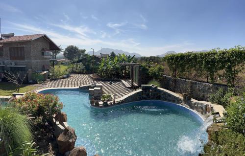 Mahiravani Villa | SaffronStays Lake House Bouganvillea, Nashik -villa with great lake views and patio dining