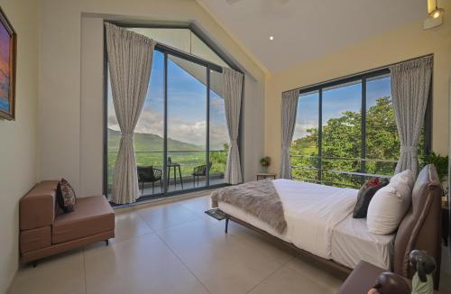 Kadadhe Villa | SaffronStays Lord's Pavilion - 6BR Luxury Villa with Lawn & Cricket Turf near Pawna