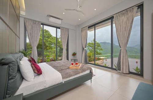 Kadadhe Villa | SaffronStays Lord's Pavilion - 6BR Luxury Villa with Lawn & Cricket Turf near Pawna