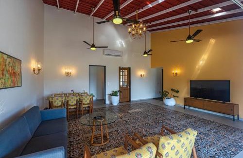 Karjat Villa | SaffronStays Mariposa Rio- 2BR Goan-style riverside pool villa with machan, garden & bonfire near Mumbai