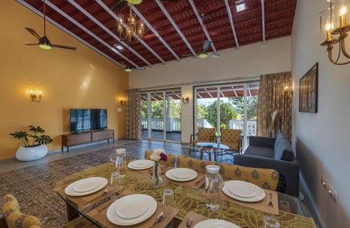 Karjat Villa | SaffronStays Mariposa Rio- 2BR Goan-style riverside pool villa with machan, garden & bonfire near Mumbai