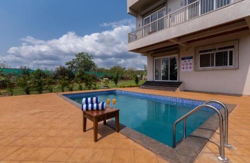 Kolad Villa | SaffronStays Midori - 4BR riverside villa with pool, lawn, terrace & access to Kundalika River rafting site