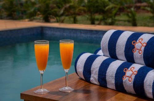 Kolad Villa | SaffronStays Midori - 4BR riverside villa with pool, lawn, terrace & access to Kundalika River rafting site
