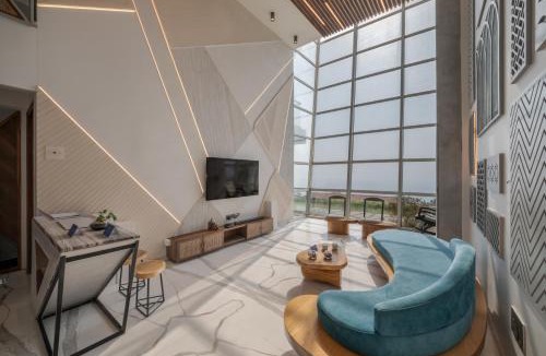 Harnai Villa | SaffronStays Nautica - 5BR hilltop villa with rooftop pool, sea views & modern interiors surrounded by greenery