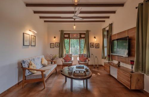 Ambavna Villa | SaffronStays Niramay - 3BR Velhe villa, infinity pool, organic farm, library, valley & forest views near Torna-Rajgad