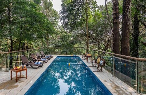 St.Stanislaus Villa Villa | SaffronStays Odeon - 4BR heritage art deco villa with cantilever pool, verandahs & forested lawns