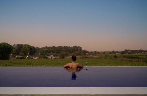 Nashik Villa | SaffronStays Onellaa, Nashik - infinity pool villa surrounded by a vineyard