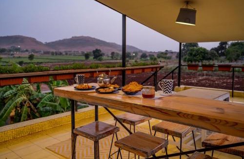 Nashik Villa | SaffronStays Onellaa, Nashik - infinity pool villa surrounded by a vineyard
