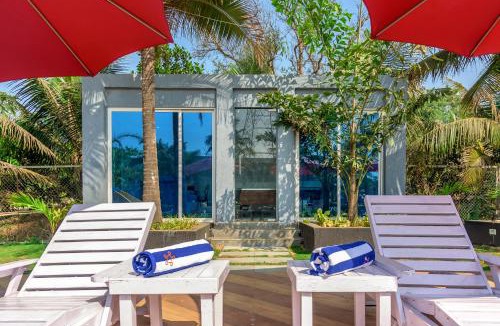 Bhiwandi Villa | SaffronStays Palm Paradise - twin 3BR villas with pool, slides, mango plantations & outdoor games near Mumbai