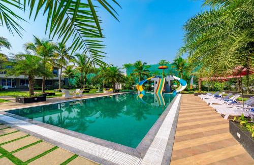 Bhiwandi Villa | SaffronStays Palm Paradise - twin 3BR villas with pool, slides, mango plantations & outdoor games near Mumbai