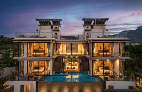 St.Stanislaus Villa Villa | SaffronStays Panorama - 8BR Lonavala villa, infinity pool, heated jacuzzi, karaoke bar, theater & rooftop sunset deck