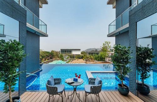 St.Stanislaus Villa Villa | SaffronStays Panorama - 8BR Lonavala villa, infinity pool, heated jacuzzi, karaoke bar, theater & rooftop sunset deck