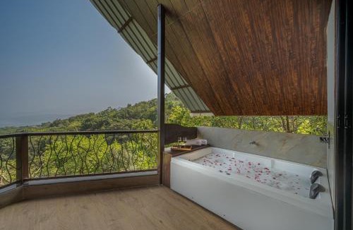 Lonavala Villa | SaffronStays Raanwaara Luxe - 2BR villa with dual balcony jacuzzis, infinity swing & private waterfall, luxurious escape