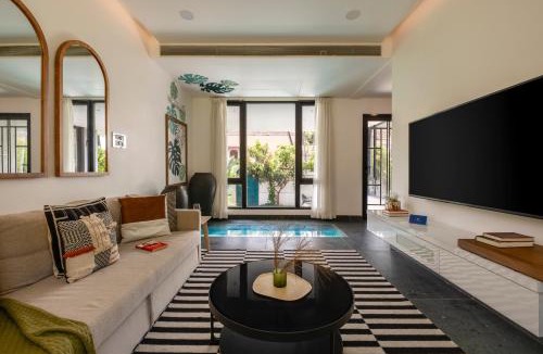 Nerul Villa | SaffronStays Rio - 4BR pet-friendly villa with glass-bottom pool, rooftop party zone & bar near Candolim & Coco Beach
