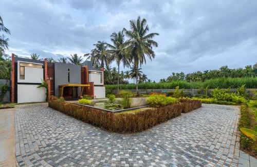 Palahalli House | SaffronStays Riverstone 3-BR Riverside Villa with Farm Views
