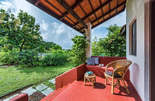 Pen Villa | SaffronStays Sattva - 2BR Konkani-style eco farmhouse with wood-fired copper baths, orchard, forest walks & stargazing