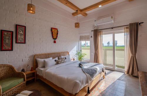 Bail Parao Villa | SaffronStays Sher Bagh - 4BR eco-friendly pool villa with jungle trails, farm-to-table meals & bonfire nights near Corbett Park