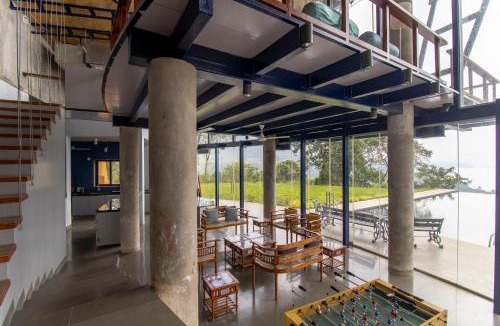 Paud Villa | SaffronStays Solasta - 2BR luxury villa with black marble infinity pool, lotus pond & dam views in Mulshi