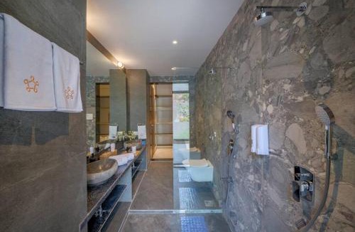 Lonavala Villa | SaffronStays Sonnet - 4BR veg pool villa with grand piano, theater, lawn & mountain views near Mumbai