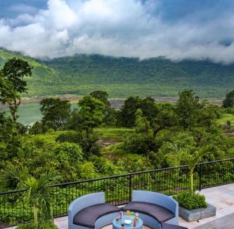 Khalapur Villa | SaffronStays Sundowner - 8BR Morbe-view villa, grand pool, outdoor bar, gazebo, TT & pool table, rain dance, award-winning