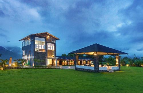 Khalapur Villa | SaffronStays Sundowner - 8BR Morbe-view villa, grand pool, outdoor bar, gazebo, TT & pool table, rain dance, award-winning