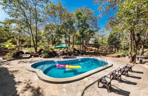 Uddar Villa | SaffronStays Terra Soul - 3BR eco-luxury pet-friendly pool villa with gazebos, bar & fish pond near Imagica & Pali Temple