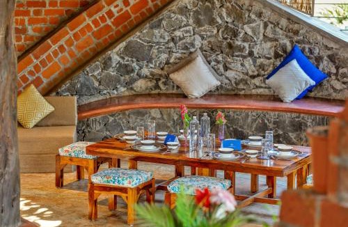 Vada Villa | SaffronStays Terracotta Trails - 2BR eco-luxury villa with earthy design, pool, open lawns & sustainable living in Wada